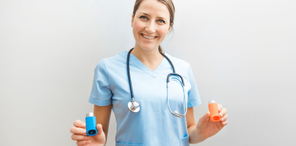 Respiratory Therapist wearing blue scrubs and a stethoscope is seen smiling and holding inhalers. Showing that Respiratory Therapy is a rewarding and fulfilling career choice.