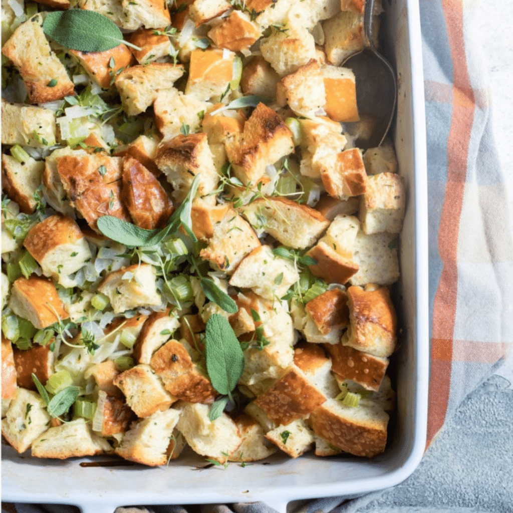A delicious serving of Stovetop Stuffing for Two, served in a cozy kitchen setting. This meal is a perfect option for travel nurses on a temporary assignment during Thanksgiving, helping them create a warm and comforting atmosphere in their temporary home.