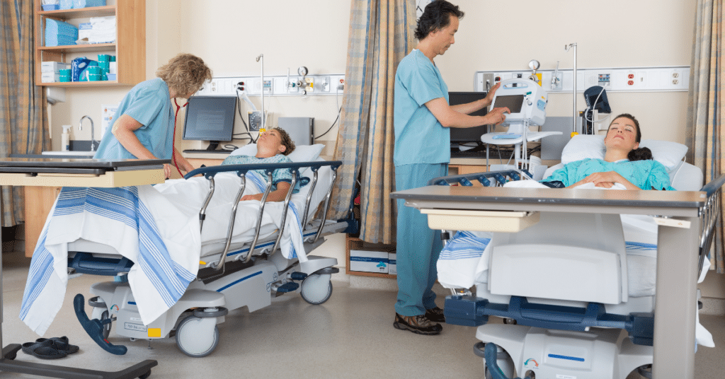 An image showing nurses attentively caring for patients in a post-operative care ward, with safe staffing ratios evident as each nurse is able to focus on a manageable number of patients, ensuring personalized and efficient healthcare.